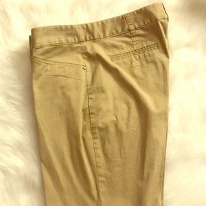 Beige MK pants that have been altered